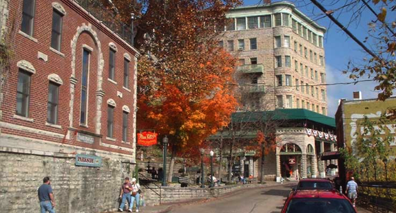 People walking in historical down town Eureka Springs.
